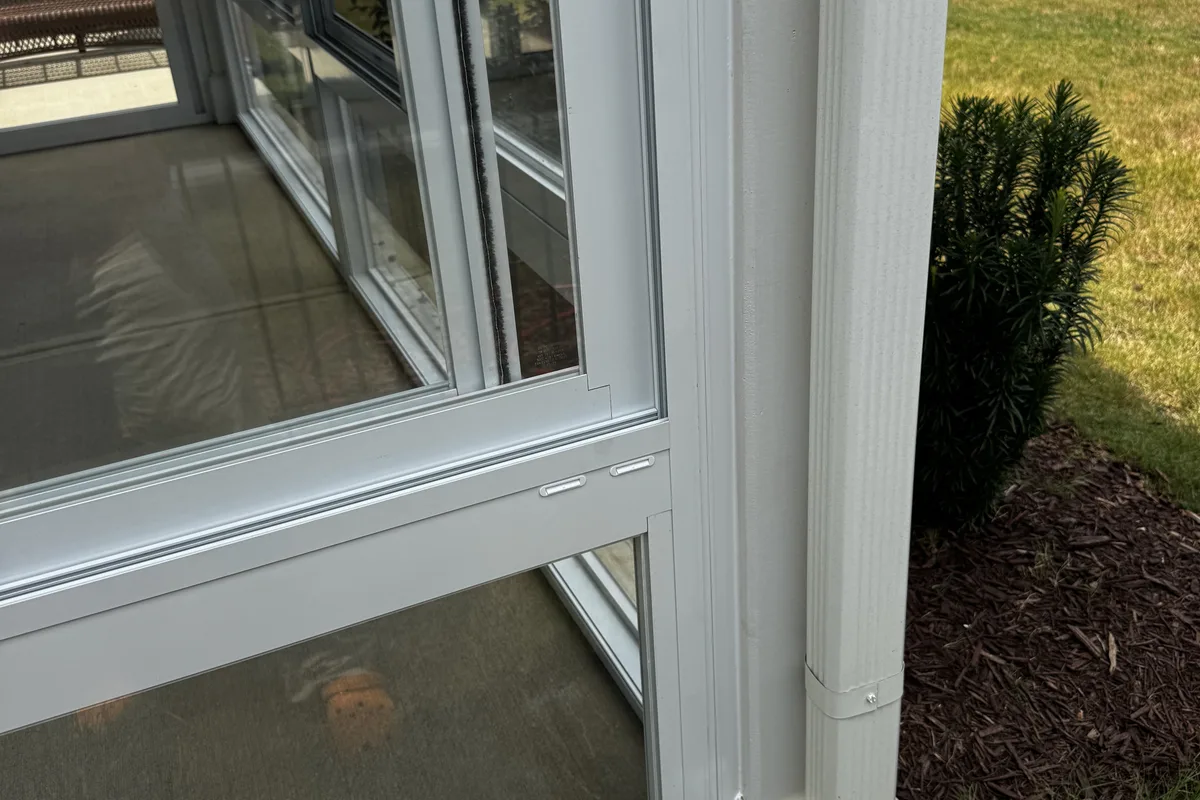 Finished glass enclosure Mantle Ridge showing structural detail