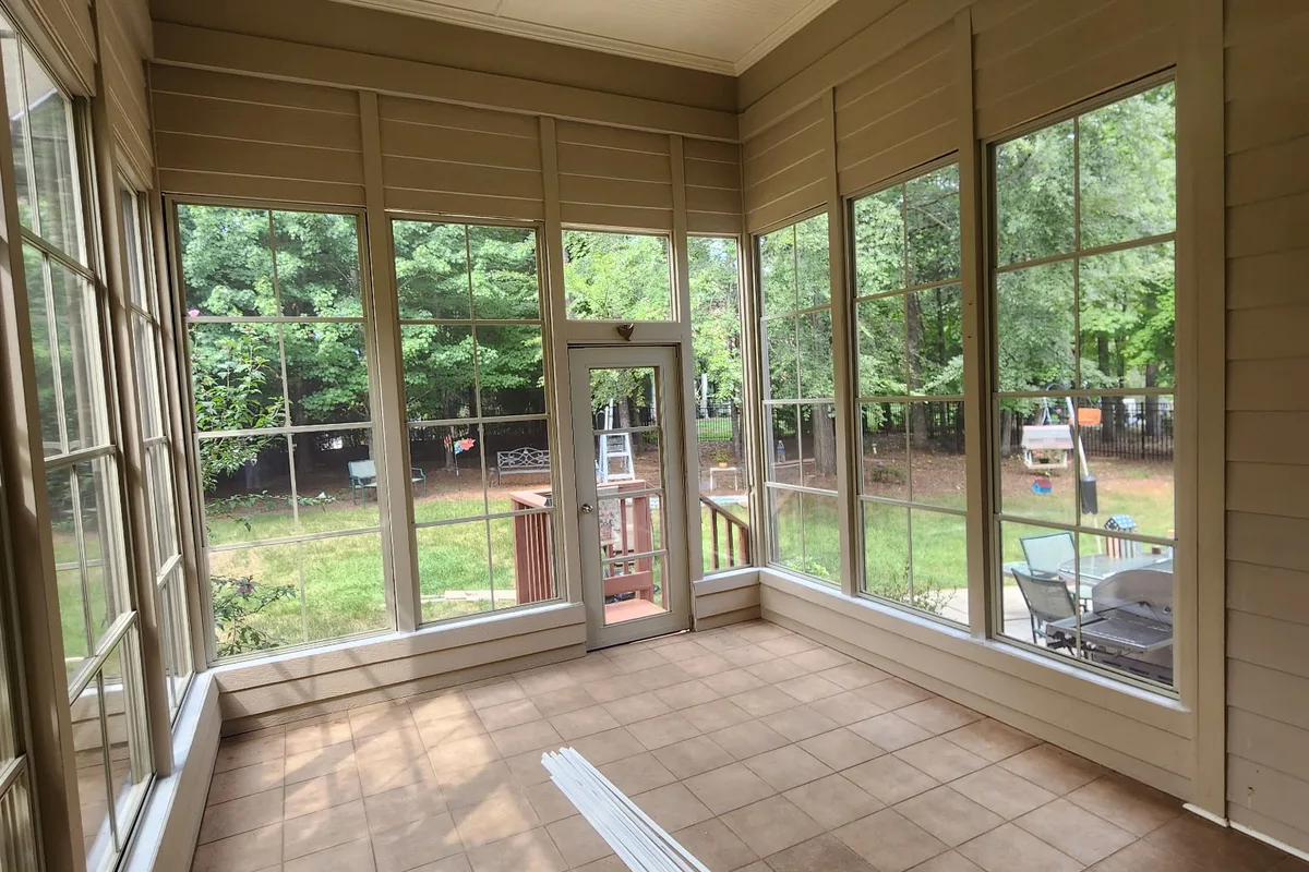 3-season vinyl film sunroom enclosure construction in progress Mecklenburg County
