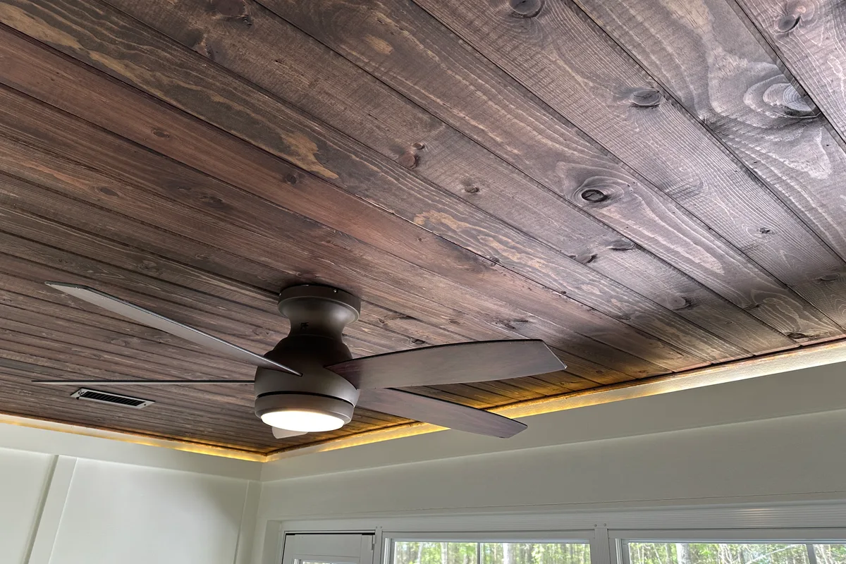 Vinyl film deck enclosure detail showing finished installation in Charlotte NC