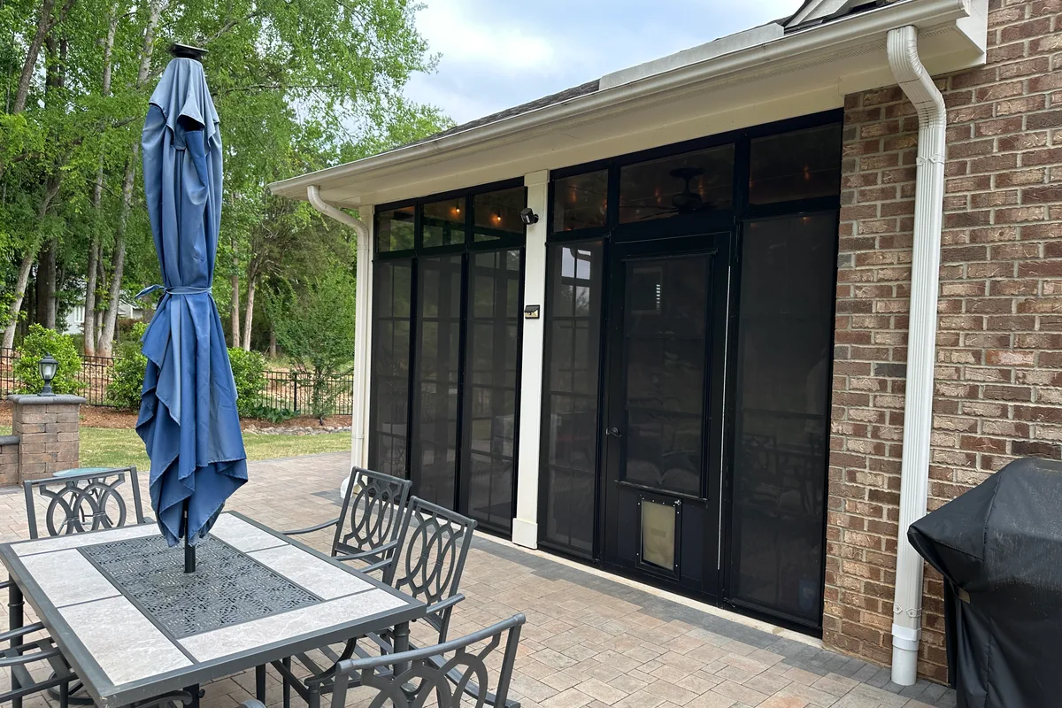 Vinyl film sunroom enclosure detail Mecklenburg County porch contractor