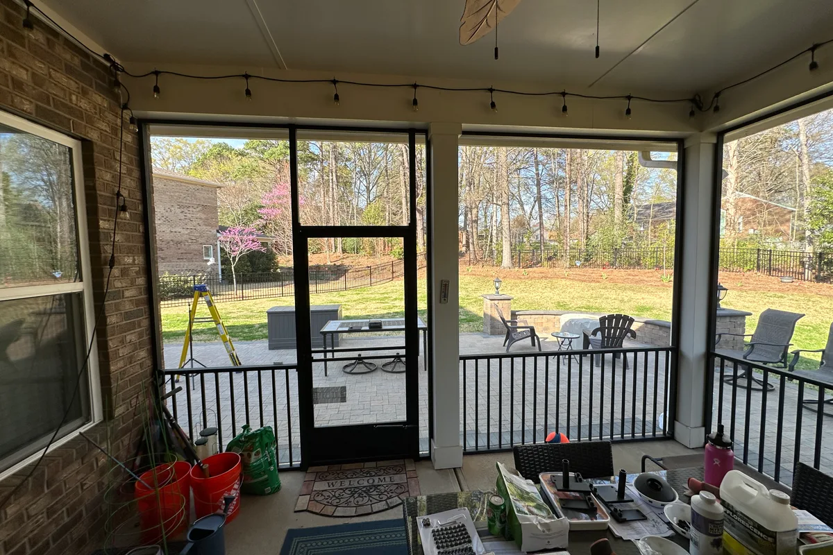 Existing porch structure before vinyl film enclosure installation Matthews North Carolina