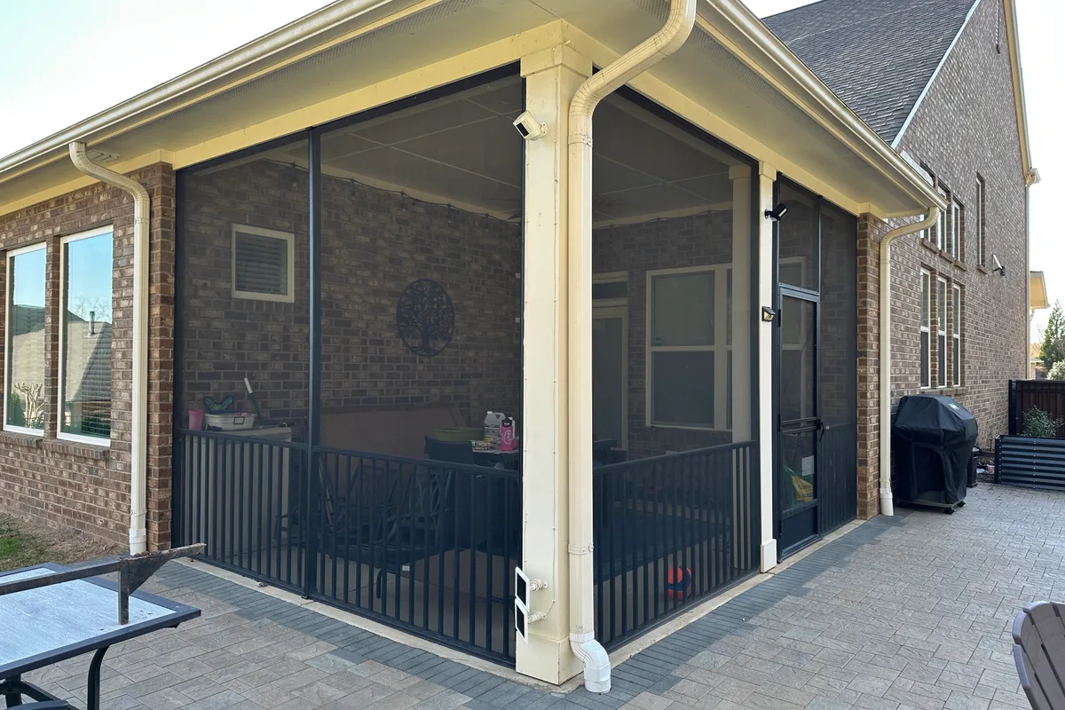 Porch before vinyl film sunroom transformation Livery Stable Charlotte area