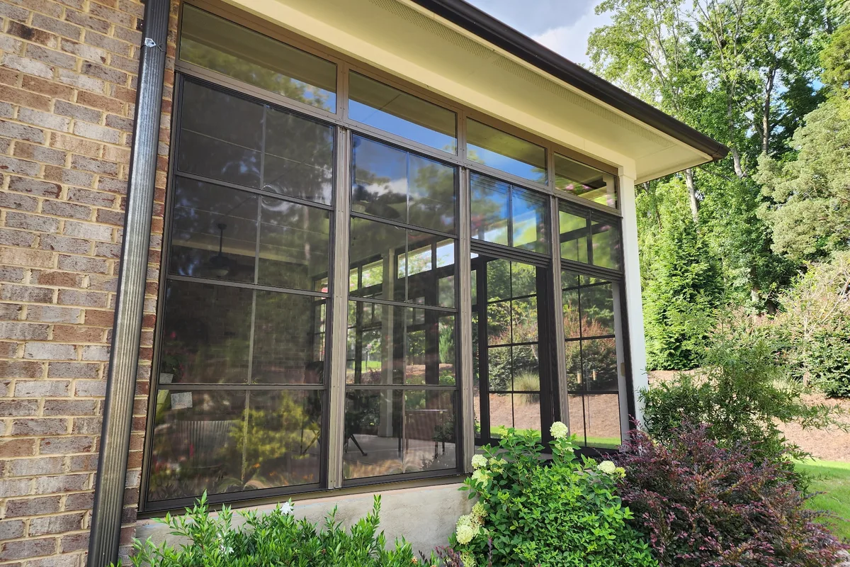 Finished 3-season porch enclosure with vinyl film system detail view